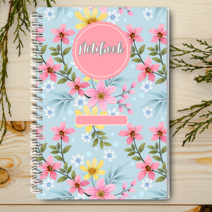 Our A4 or A5 Notebook Spiral Bound with a pink and blue floral cover cover is handmade by a small business in Ballachulish, Scotland.