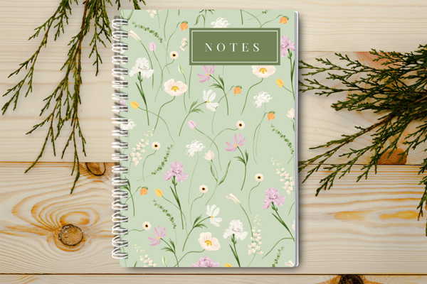 Our A4 or A5 Notebook Spiral Bound with a green floral cover is handmade by a small business in Ballachulish, Scotland.