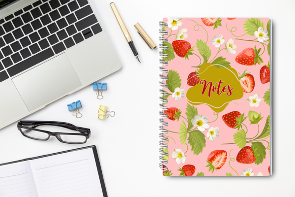 Our A4 or A5 Notebook Spiral Bound with strawberries on the cover is handmade by a small business in Ballachulish, Scotland. The cover is printed on 300gsm glossy paper and the notebook has 75 lined pages inside (so 150 pages for you to write on).