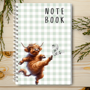 Our A4 or A5 Notebook with a Highland Cow Ceidlidh Dancing on the cover is handmade by a small business in Ballachulish, Scotland.