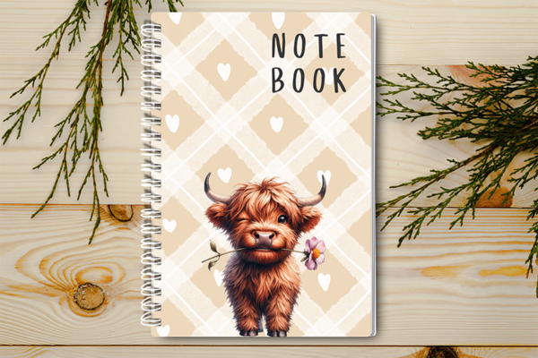 A4 / A5 Notebook Spiral Bound with a Highland Cow Holding Bringing a flower