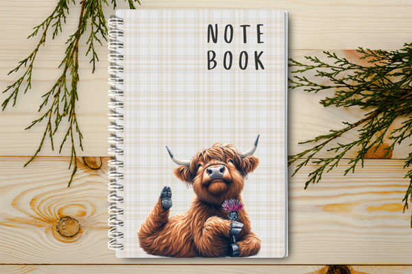 A4 / A5 Notebook Spiral Bound with a Highland Cow Holding a Thistle Flower